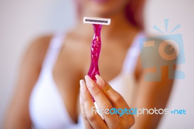 Pink Hair Attractive Woman Hold Pink Female Shaver In Hand Stock Photo