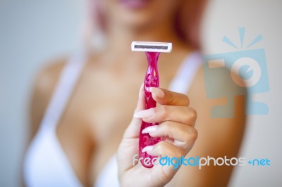 Pink Hair Attractive Woman Hold Pink Female Shaver In Hand Stock Photo