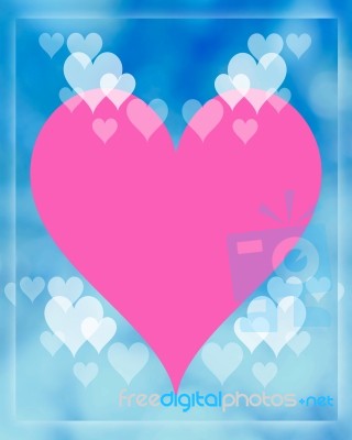 Pink Heart On Blue Blurry Background Stock Image