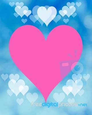 Pink Heart On Blue Blurry Background Stock Image