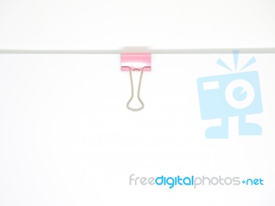 Pink Paperclip Attached On White Paper Isolated Stock Photo