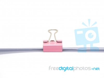 Pink Paperclip Attached On White Paper Isolated Stock Photo