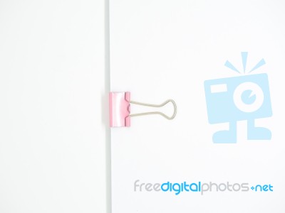 Pink Paperclip Attached On White Paper Isolated Stock Photo