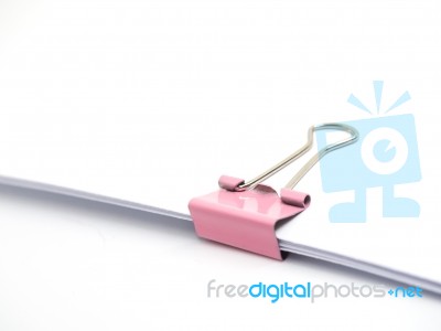 Pink Paperclip Attached On White Paper Isolated Stock Photo