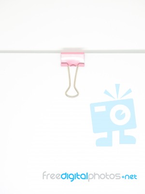 Pink Paperclip Attached On White Paper Isolated Stock Photo