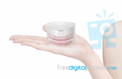 Pink Triangle Cosmetic Jar On Hand Isolated Stock Photo