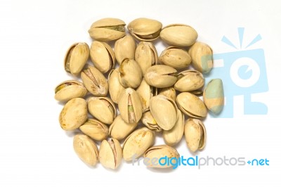 Pistachios On White Background Stock Photo