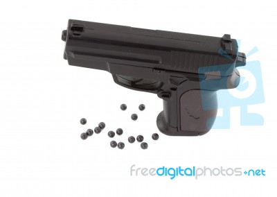 Pistol And Bullet Stock Photo