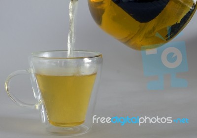  Pitcher Of Tea With Full Glass Of Tea Stock Photo