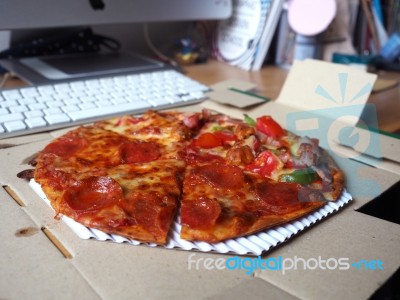 Pizza On Working Table Stock Photo