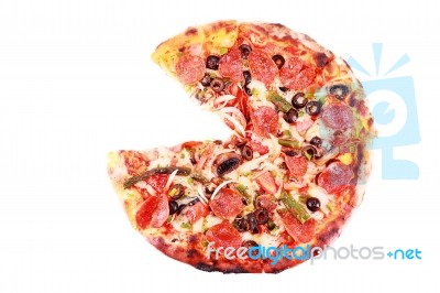 Pizza With One Slice Removed Stock Photo