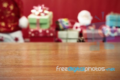 Plank And Christmas Gifts Stock Photo