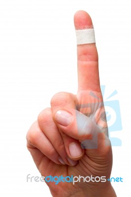 Plaster On Forefinger Stock Photo