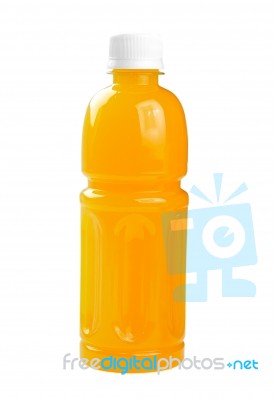 Plastic Bottle And Glass Of Orange Juice Stock Photo