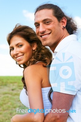 Playful Couple Smiling Stock Photo