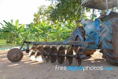 Plow Tractor Close Up On Field Stock Photo