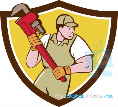 Plumber Holding Pipe Wrench Crest Cartoon Stock Image