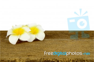 Plumeria Flower On Old Wood Table Stock Photo