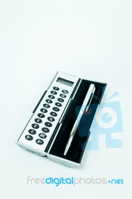 Pocket Box Of Calculator And Pen Isolated On White Background Stock Photo