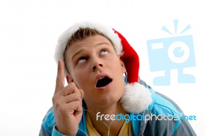 Pointing Male With Christmas Hat Stock Photo