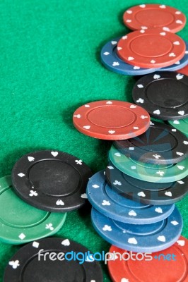 Poker Chips On Green Baize Casino Stock Photo