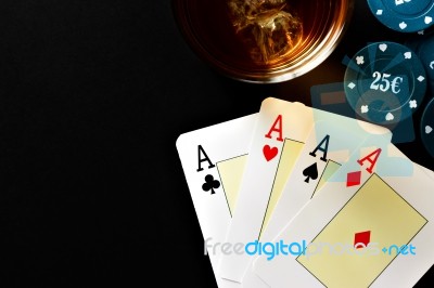 Poker, Whiskey And Money Stock Photo