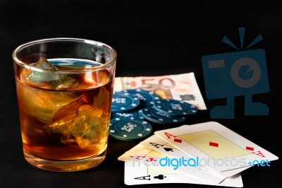 Poker, Whisky And Money Stock Photo