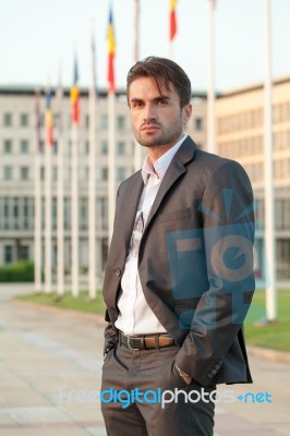 Politician In Front Of Parliament Stock Photo