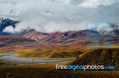 Polychrome In The Clouds  Stock Photo