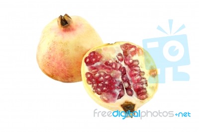 Pomegranate And One Half On White Background Stock Photo