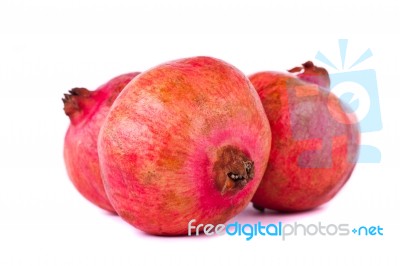 Pomegranates On White Stock Photo