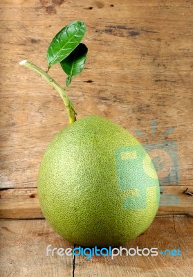 Pomelo Fruit On The Wooden Background Stock Photo