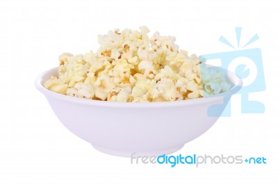 Popcorn In Round Bowl On White Background Stock Photo