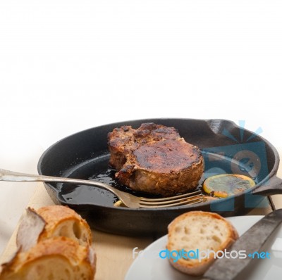 Pork Chop Seared On Iron Skillet Stock Photo