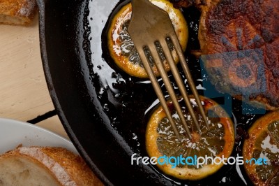 Pork Chop Seared On Iron Skillet Stock Photo