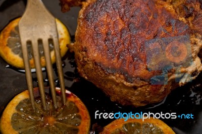 Pork Chop Seared On Iron Skillet Stock Photo