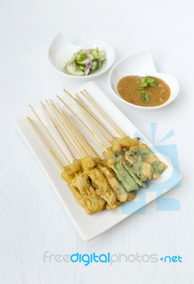 Pork Satay With Peanut Sauce And Cucumber Salsa Stock Photo