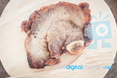 Pork Steak On Wooden Plate Stock Photo