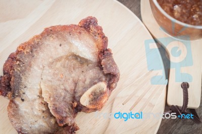 Pork Steak On Wooden Plate Stock Photo