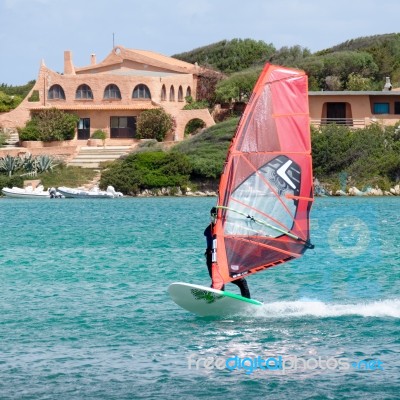 Porto Pollo, Sardinia/italy - May 21 : Windsurfing At Porto Poll… Stock Photo