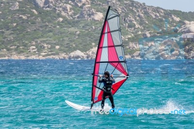 Porto Pollo, Sardinia/italy - May 21 : Windsurfing At Porto Poll… Stock Photo