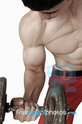 Portrait Muscular Male Lifting Dumbbells Stock Photo