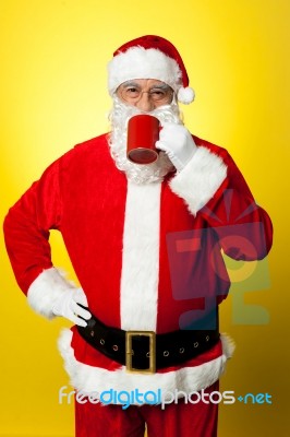 Portrait Of A Aged Santa Sipping Coffee Stock Photo