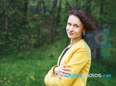 Portrait Of A Beautiful Young Woman In The Park Stock Photo