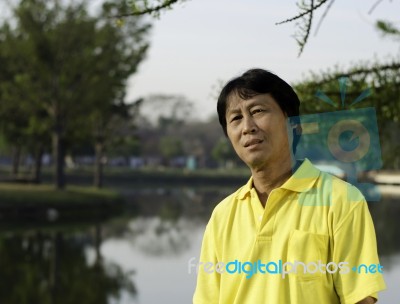 Portrait Of A Happy Man Thailand Park Stock Photo