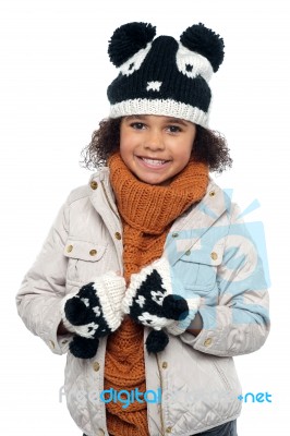 Portrait Of A Lovely Little Girl In Winter Outfit Stock Photo