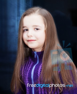 Portrait Of A Pretty Little Girl Near The Window Stock Photo