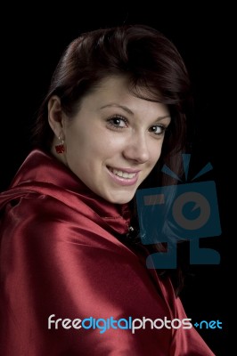 Portrait Of A Red Hair Women In Red Gown Stock Photo