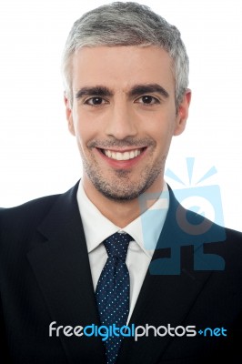 Portrait Of A Smiling Businessman Stock Photo