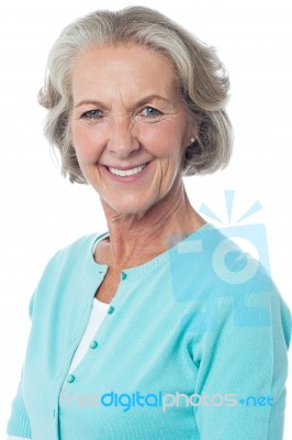 Portrait Of A Smiling Senior Woman Stock Photo